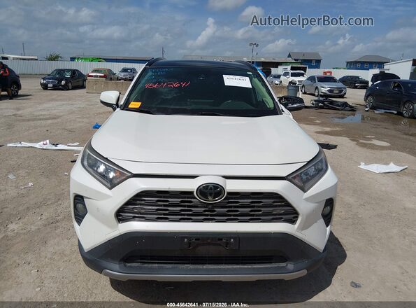 JTMN1RFV7KD517527 2019 TOYOTA RAV4 White უკანა სალონის ხედი