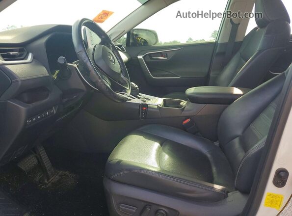 JTMN1RFV7KD521559 2019 TOYOTA RAV4 White Вид салону спереду