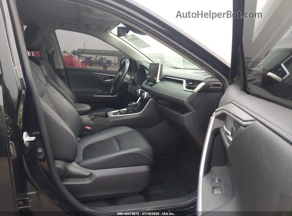 JTMN1RFV9KD521045 2019 TOYOTA RAV4 Black Front interior view