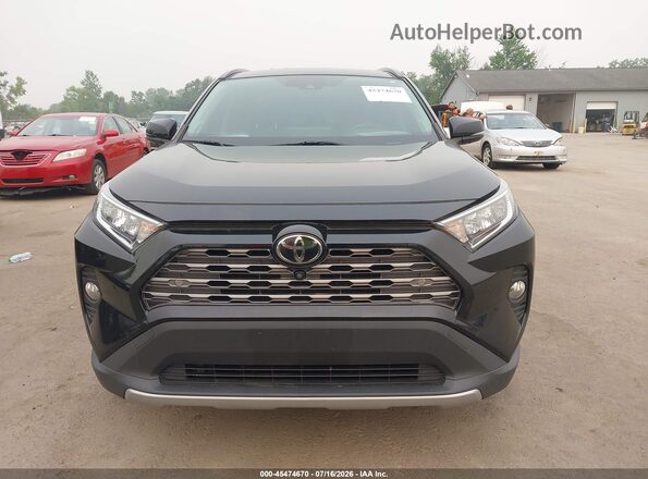 JTMN1RFV9KD521045 2019 TOYOTA RAV4 Black Rear interior view