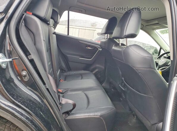 JTMN1RFVXKD501449 2019 TOYOTA RAV4 Black Вид задньої частини салону