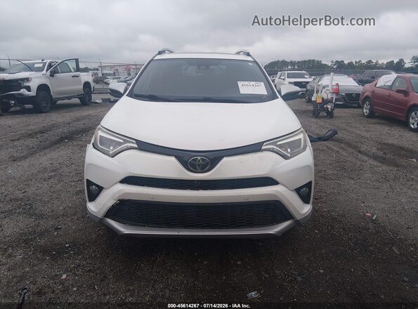 JTMNFREV0GJ083141 2016 TOYOTA RAV4 White Widok wnętrza z tyłu