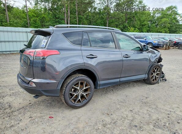 JTMNFREV0JJ722481 2018 TOYOTA RAV4 Charcoal Trasero derecho