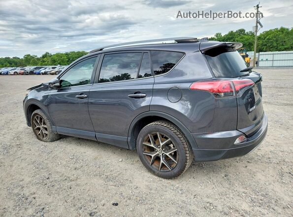 JTMNFREV0JJ722481 2018 TOYOTA RAV4 Charcoal Trasero izquierdo