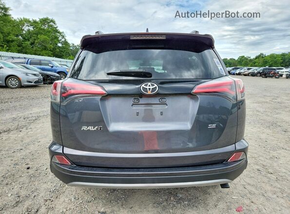 JTMNFREV0JJ722481 2018 TOYOTA RAV4 Charcoal Vista trasera