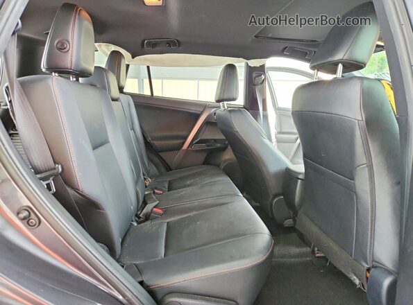 JTMNFREV0JJ722481 2018 TOYOTA RAV4 Charcoal Vista interior trasera