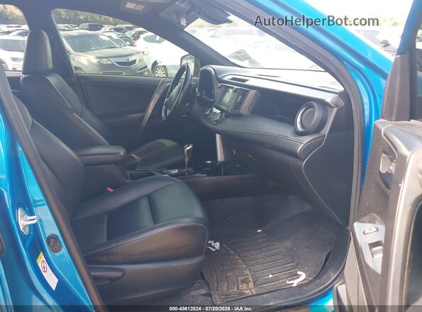 JTMNFREV1GD081140 2016 TOYOTA RAV4 Light Blue Front interior view