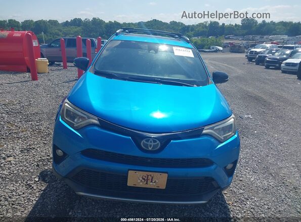 JTMNFREV1GD081140 2016 TOYOTA RAV4 Light Blue Front view