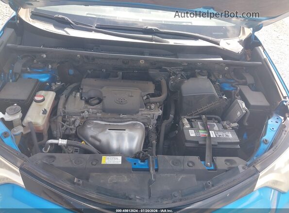 JTMNFREV1GD081140 2016 TOYOTA RAV4 Light Blue Rear view