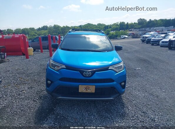 JTMNFREV1GD081140 2016 TOYOTA RAV4 Light Blue Dashboard view