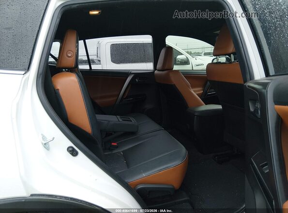 JTMNFREV1JJ749530 2018 TOYOTA RAV4 White Widok naklejki z numerem VIN