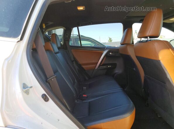 JTMNFREV2GJ074571 2016 TOYOTA RAV4 White Widok wnętrza z tyłu