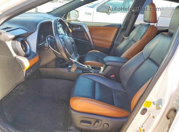 JTMNFREV2GJ074571 2016 TOYOTA RAV4 White Widok wnętrza z przodu