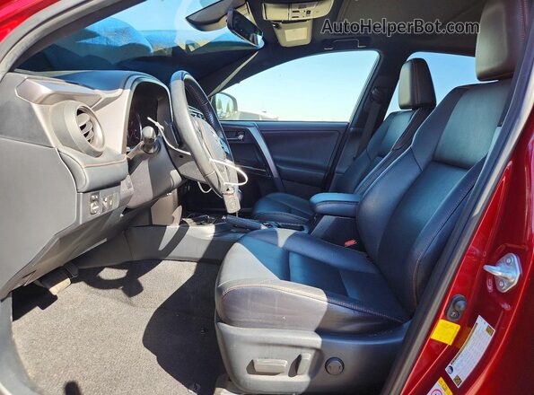 JTMNFREV7JD127688 2018 TOYOTA RAV4 Burgundy Vista interior delantera
