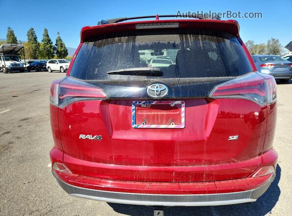 JTMNFREV7JD127688 2018 TOYOTA RAV4 Burgundy Vista trasera