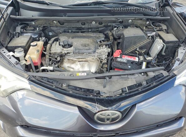 JTMNFREV8JD120376 2018 TOYOTA RAV4 Gray Vista interior trasera