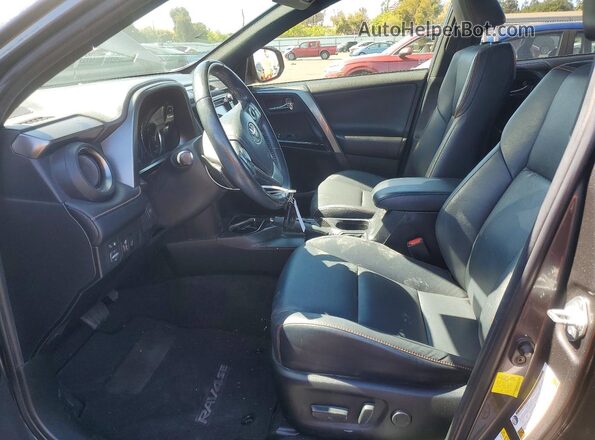 JTMNFREV8JD122578 2018 TOYOTA RAV4 Gray Vista interior delantera