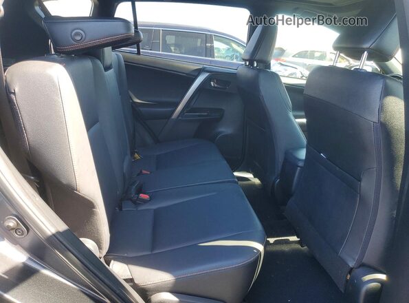 JTMNFREV8JD122578 2018 TOYOTA RAV4 Gray Vista interior trasera