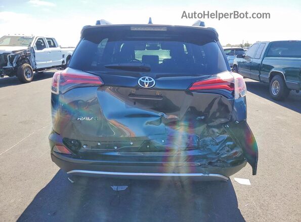 JTMNFREV8JD122578 2018 TOYOTA RAV4 Gray Vista trasera