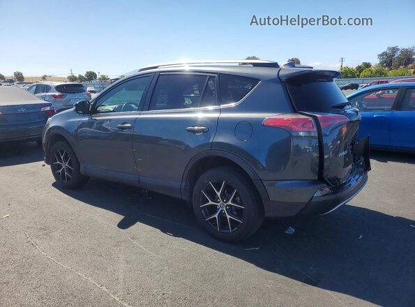 JTMNFREV8JD122578 2018 TOYOTA RAV4 Gray Trasero izquierdo