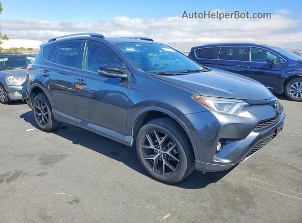 JTMNFREV8JD122578 2018 TOYOTA RAV4 Gray Delantero derecho