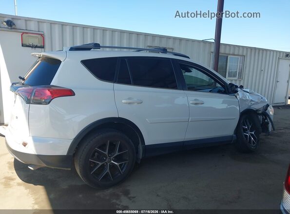 JTMNFREV8JJ741263 2018 TOYOTA RAV4 White უკანა სალონის ხედი