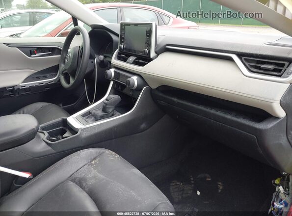JTMP1RFV2KD515726 2019 TOYOTA RAV4 Красный Вид салона спереди