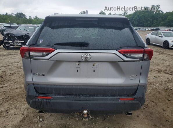 JTMP1RFV6KD012717 2019 TOYOTA RAV4 Silver Rear view