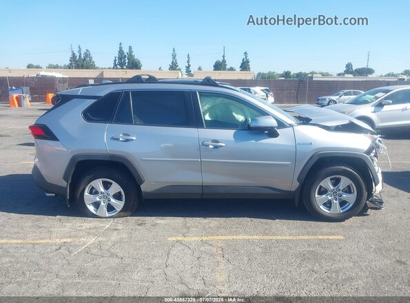JTMR6RFV1LD006366 2020 TOYOTA RAV4 HYBRID Silver Rear interior view