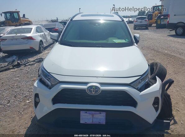JTMR6RFV9MD509967 2021 TOYOTA RAV4 HYBRID White Вид задньої частини салону