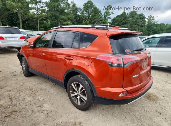 JTMRFREV0GJ066518 2016 TOYOTA RAV4 Orange Trasero izquierdo