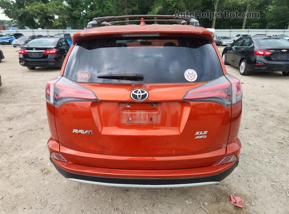 JTMRFREV0GJ066518 2016 TOYOTA RAV4 Orange Vista trasera