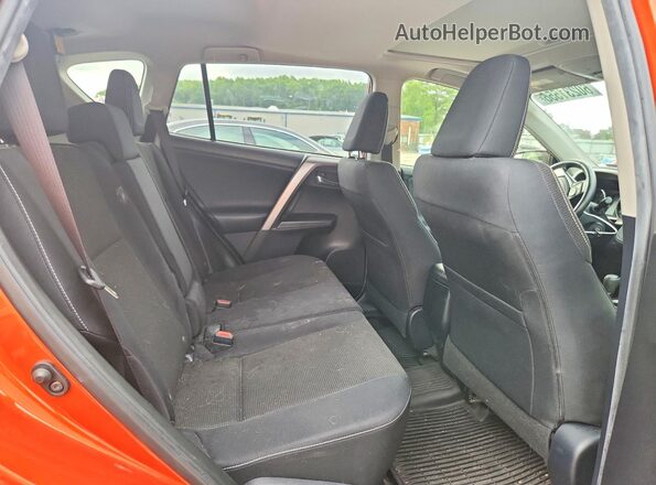 JTMRFREV0GJ066518 2016 TOYOTA RAV4 Orange Vista de los asientos traseros