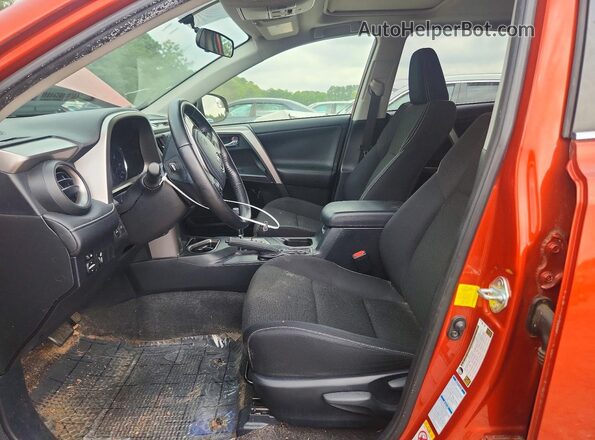JTMRFREV0GJ066518 2016 TOYOTA RAV4 Orange Vista interior delantera