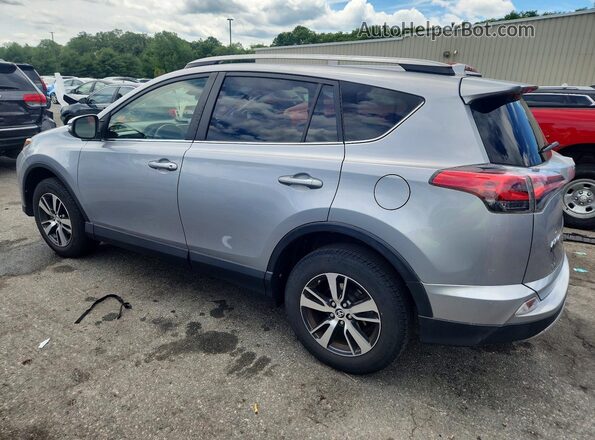 JTMRFREV0JD235295 2018 TOYOTA RAV4 Silver უკანა მარცხენა