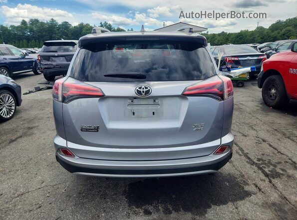 JTMRFREV0JD235295 2018 TOYOTA RAV4 Silver უკანა ხედი