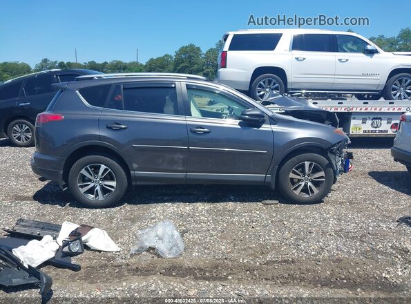 JTMRFREV0JJ726709 2018 TOYOTA RAV4 Gray Widok wnętrza z tyłu
