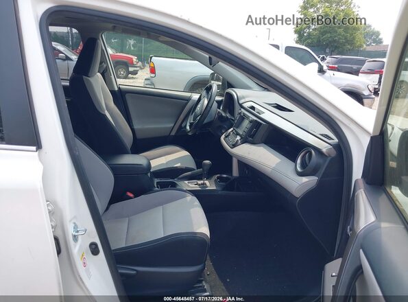 JTMRFREV1GD193129 2016 TOYOTA RAV4 White Вид салону спереду