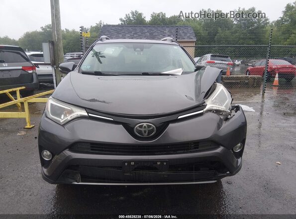 JTMRFREV1HJ113475 2017 TOYOTA RAV4 Black Dashboard view