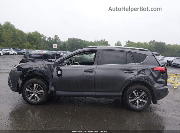 JTMRFREV1HJ113475 2017 TOYOTA RAV4 Black Rear interior view