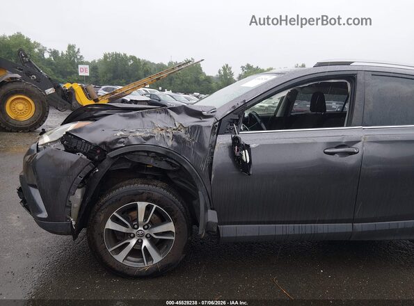 JTMRFREV1HJ113475 2017 TOYOTA RAV4 Black Front view