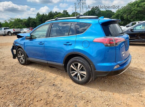 JTMRFREV2GJ067329 2016 TOYOTA RAV4 Blue Trasero izquierdo