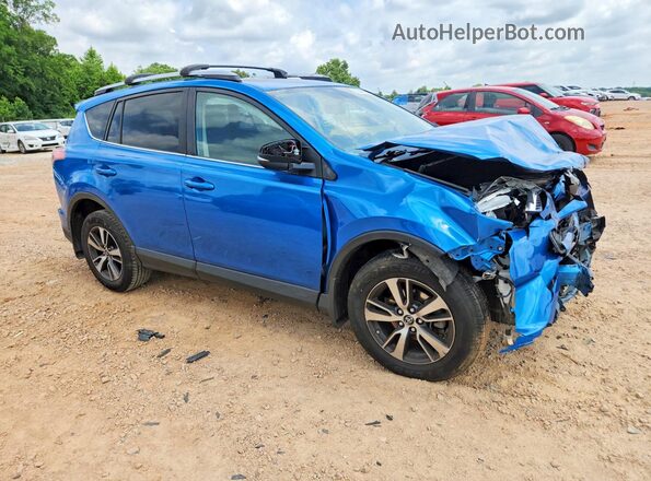 JTMRFREV2GJ067329 2016 TOYOTA RAV4 Blue Delantero derecho