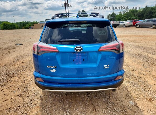 JTMRFREV2GJ067329 2016 TOYOTA RAV4 Blue Vista trasera