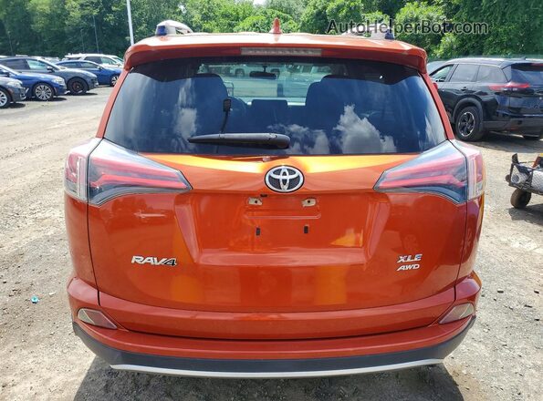 JTMRFREV2GJ071512 2016 TOYOTA RAV4 Orange Հետևի տեսք