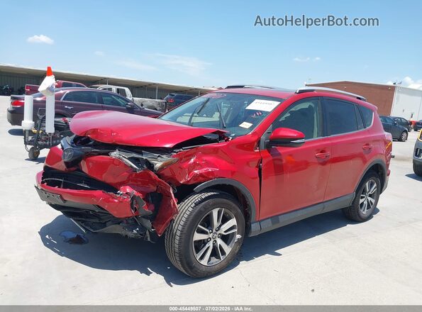 JTMRFREV2GJ073597 2016 TOYOTA RAV4 Burgundy Առջևի ձախ երեք քառորդ տեսարան