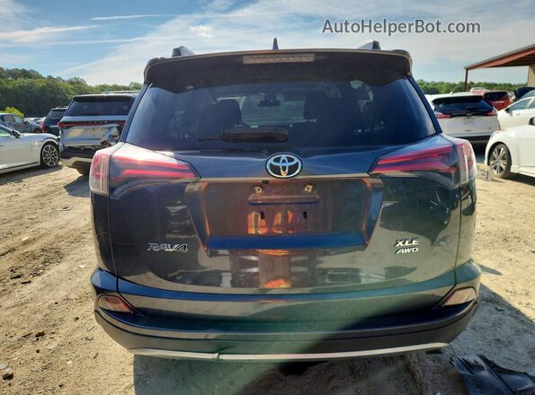 JTMRFREV2HD202129 2017 TOYOTA RAV4 Gray Vista trasera