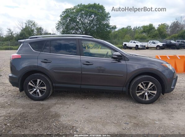 JTMRFREV2HJ147635 2017 TOYOTA RAV4 Gray უკანა სალონის ხედი