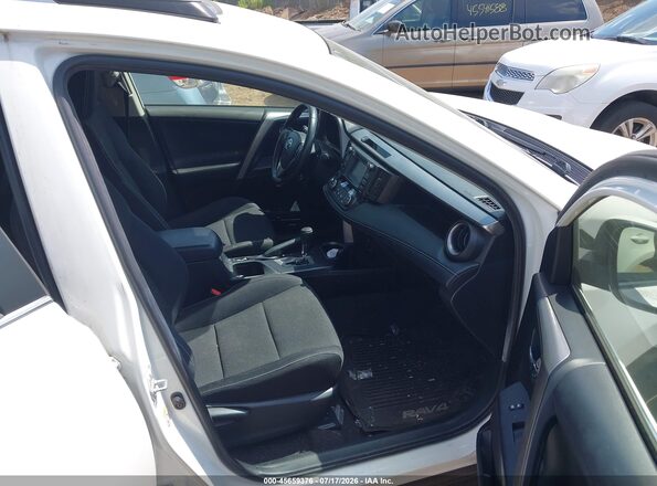 JTMRFREV2HJ709842 2017 TOYOTA RAV4 Белый Вид салона спереди