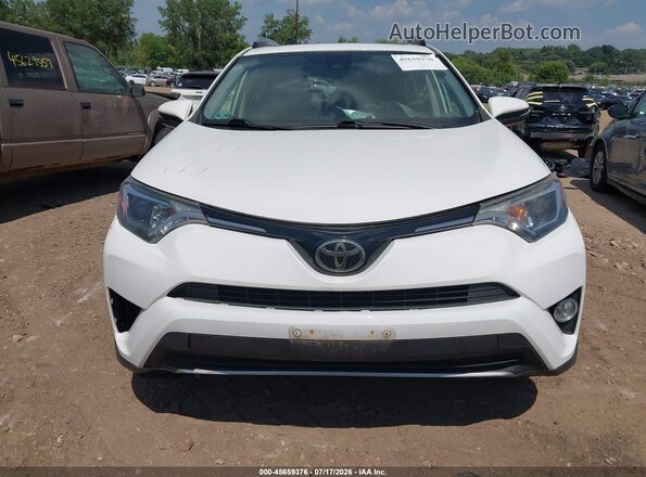 JTMRFREV2HJ709842 2017 TOYOTA RAV4 Белый Вид щитка приборов
